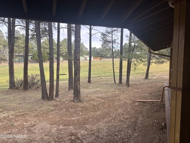 Fantastic golf course location home. Cedar siding and rock on Continental Country Club in Arizona - for sale on GolfHomes.com, golf home, golf lot