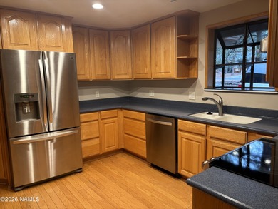 Fantastic golf course location home. Cedar siding and rock on Continental Country Club in Arizona - for sale on GolfHomes.com, golf home, golf lot