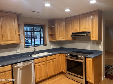 Fantastic golf course location home. Cedar siding and rock on Continental Country Club in Arizona - for sale on GolfHomes.com, golf home, golf lot