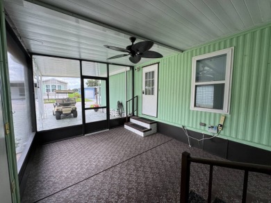 This immaculate, well-maintained 2 bedroom/2 bath manufactured on Lake Henry Golf Club in Florida - for sale on GolfHomes.com, golf home, golf lot