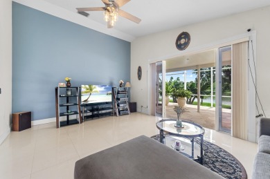 Welcome to 21196 Via Ventura, a rare lakefront estate in Boca on Boca Lago Golf and Country Club in Florida - for sale on GolfHomes.com, golf home, golf lot