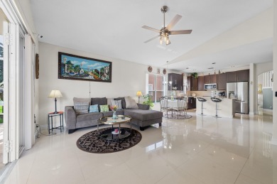Welcome to 21196 Via Ventura, a rare lakefront estate in Boca on Boca Lago Golf and Country Club in Florida - for sale on GolfHomes.com, golf home, golf lot