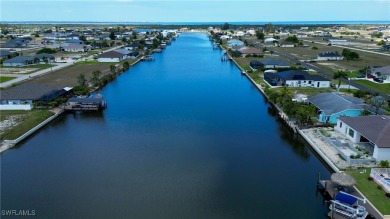 The charm of Old Florida greets you at the curb with this 3/2 on Burnt Store Golf Club in Florida - for sale on GolfHomes.com, golf home, golf lot
