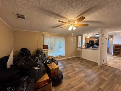 This immaculate, well-maintained 2 bedroom/2 bath manufactured on Lake Henry Golf Club in Florida - for sale on GolfHomes.com, golf home, golf lot