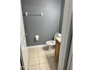 COZY FAMILY LIVING IN FLEMING ISLAND Welcome to 1545 Vineland on Golf Club At Fleming Island in Florida - for sale on GolfHomes.com, golf home, golf lot