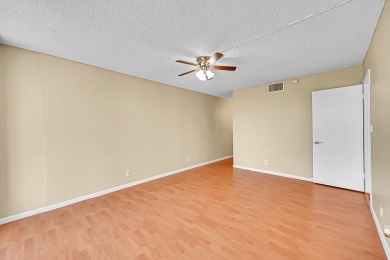 ALL AGES condo blends style & function! Spacious bedroom on Inverrary Country Club in Florida - for sale on GolfHomes.com, golf home, golf lot