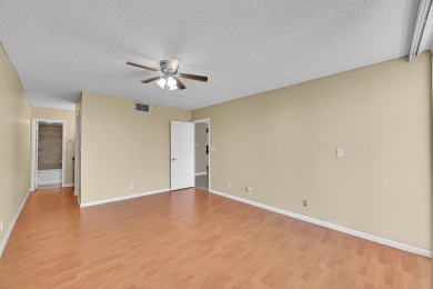 ALL AGES condo blends style & function! Spacious bedroom on Inverrary Country Club in Florida - for sale on GolfHomes.com, golf home, golf lot