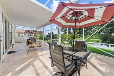 Welcome to 21196 Via Ventura, a rare lakefront estate in Boca on Boca Lago Golf and Country Club in Florida - for sale on GolfHomes.com, golf home, golf lot