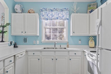 BEACH THEMED GROUND FLOOR END CORNER UNIT. THIS UNIT HAS BEEN on Barefoot Resort and Golf Club  in South Carolina - for sale on GolfHomes.com, golf home, golf lot