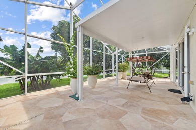 Welcome to 21196 Via Ventura, a rare lakefront estate in Boca on Boca Lago Golf and Country Club in Florida - for sale on GolfHomes.com, golf home, golf lot