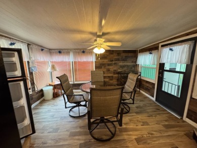 This immaculate, well-maintained 2 bedroom/2 bath manufactured on Lake Henry Golf Club in Florida - for sale on GolfHomes.com, golf home, golf lot