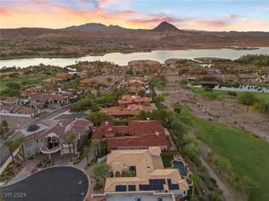 Experience the epitome of luxury and elegance in this beautiful on South Shore At Lake Las Vegas in Nevada - for sale on GolfHomes.com, golf home, golf lot