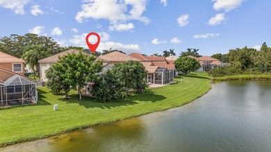 Welcome to 21196 Via Ventura, a rare lakefront estate in Boca on Boca Lago Golf and Country Club in Florida - for sale on GolfHomes.com, golf home, golf lot