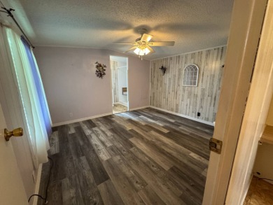 This immaculate, well-maintained 2 bedroom/2 bath manufactured on Lake Henry Golf Club in Florida - for sale on GolfHomes.com, golf home, golf lot