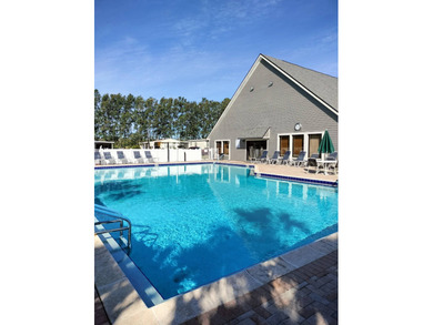 This immaculate, well-maintained 2 bedroom/2 bath manufactured on Lake Henry Golf Club in Florida - for sale on GolfHomes.com, golf home, golf lot