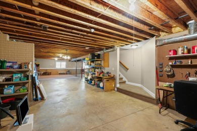 Welcome to this beautifully designed all-brick zero-lot home on The Legends of Champaign in Illinois - for sale on GolfHomes.com, golf home, golf lot