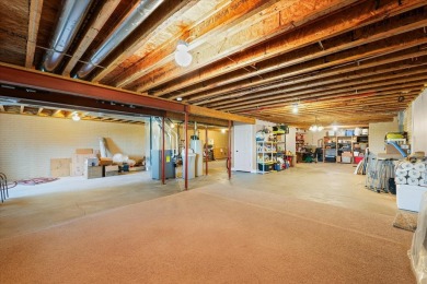 Welcome to this beautifully designed all-brick zero-lot home on The Legends of Champaign in Illinois - for sale on GolfHomes.com, golf home, golf lot