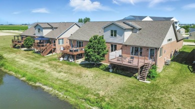 Welcome to this beautifully designed all-brick zero-lot home on The Legends of Champaign in Illinois - for sale on GolfHomes.com, golf home, golf lot