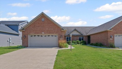 Welcome to this beautifully designed all-brick zero-lot home on The Legends of Champaign in Illinois - for sale on GolfHomes.com, golf home, golf lot