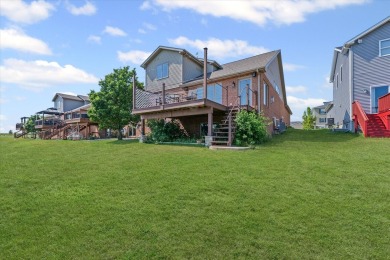 Welcome to this beautifully designed all-brick zero-lot home on The Legends of Champaign in Illinois - for sale on GolfHomes.com, golf home, golf lot
