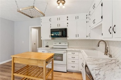 Adorable updated and renovated home under $350,000 in sought on Collins Hill Golf Club in Georgia - for sale on GolfHomes.com, golf home, golf lot