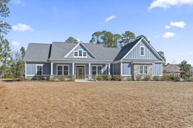 This stunning custom farmhouse-style home sits on a spacious 0 on Wild Wing Plantation in South Carolina - for sale on GolfHomes.com, golf home, golf lot