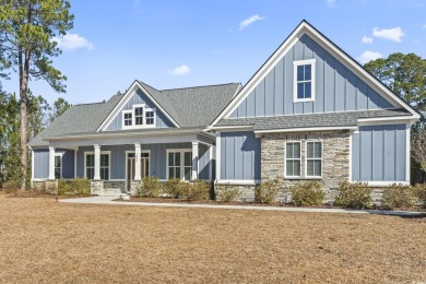 This stunning custom farmhouse-style home sits on a spacious 0 on Wild Wing Plantation in South Carolina - for sale on GolfHomes.com, golf home, golf lot