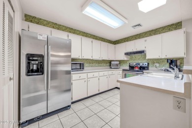 Experience the best of resort living in this popular Model D on Sun Village Golf Course in Arizona - for sale on GolfHomes.com, golf home, golf lot