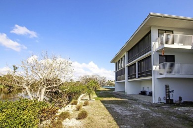 Top-floor unit wth peaceful river to golf course views from the on Beachview Golf Club in Florida - for sale on GolfHomes.com, golf home, golf lot