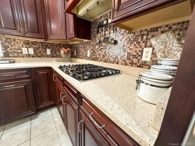 Step into timeless elegance with this one-owner, custom-built on Brickshire Golf Club in Virginia - for sale on GolfHomes.com, golf home, golf lot