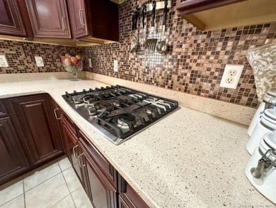 Step into timeless elegance with this one-owner, custom-built on Brickshire Golf Club in Virginia - for sale on GolfHomes.com, golf home, golf lot