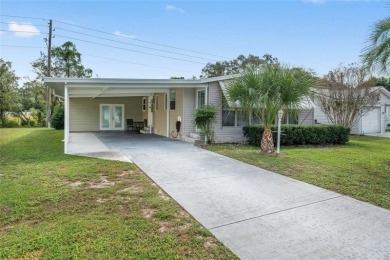 Welcome home to this charming 2-bedroom, 2 bath manufactured on El Diablo Executive Golf Course in Florida - for sale on GolfHomes.com, golf home, golf lot