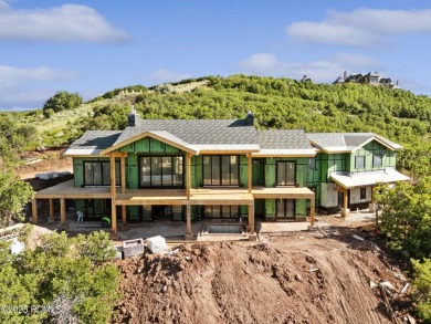 Welcome to your dream home in a private gated community, where on Glenwild Golf Club and Spa in Utah - for sale on GolfHomes.com, golf home, golf lot