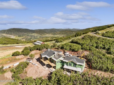 Welcome to your dream home in a private gated community, where on Glenwild Golf Club and Spa in Utah - for sale on GolfHomes.com, golf home, golf lot