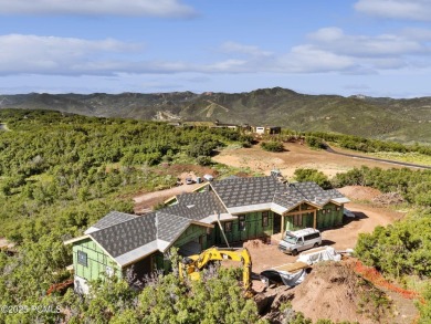 Welcome to your dream home in a private gated community, where on Glenwild Golf Club and Spa in Utah - for sale on GolfHomes.com, golf home, golf lot