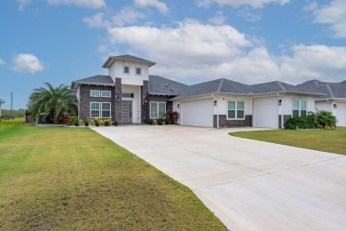 This exquisite custom-built home offers 4 bedrooms, 3 full baths on South Padre Island Golf Club in Texas - for sale on GolfHomes.com, golf home, golf lot