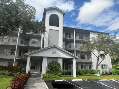 Discover this bright and spacious 2-bedroom, 2 bath condo with on Flamingo Lakes Country Club in Florida - for sale on GolfHomes.com, golf home, golf lot
