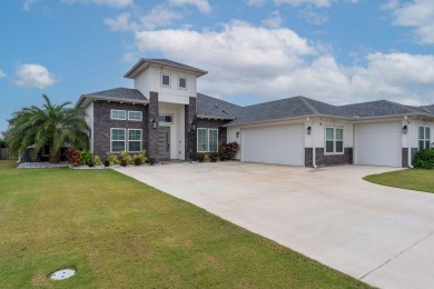 This exquisite custom-built home offers 4 bedrooms, 3 full baths on South Padre Island Golf Club in Texas - for sale on GolfHomes.com, golf home, golf lot