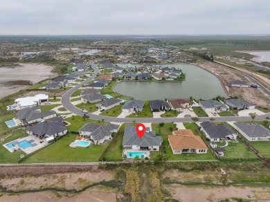 This exquisite custom-built home offers 4 bedrooms, 3 full baths on South Padre Island Golf Club in Texas - for sale on GolfHomes.com, golf home, golf lot