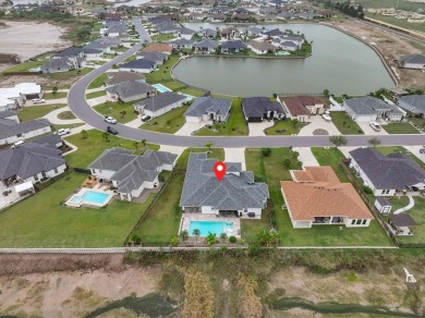 This exquisite custom-built home offers 4 bedrooms, 3 full baths on South Padre Island Golf Club in Texas - for sale on GolfHomes.com, golf home, golf lot