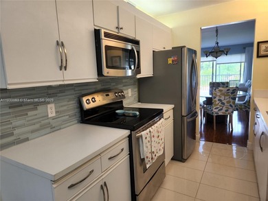 Discover this bright and spacious 2-bedroom, 2 bath condo with on Flamingo Lakes Country Club in Florida - for sale on GolfHomes.com, golf home, golf lot