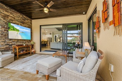 An entertainers dream home situated on a 1/3 acre lot with views on Pelican Preserve Golf Club in Florida - for sale on GolfHomes.com, golf home, golf lot