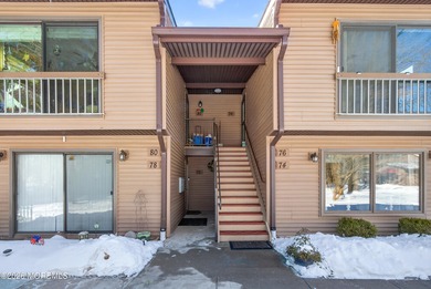 Quiet, private second-floor Navesink model set among the trees on Shadow Lake Village in New Jersey - for sale on GolfHomes.com, golf home, golf lot