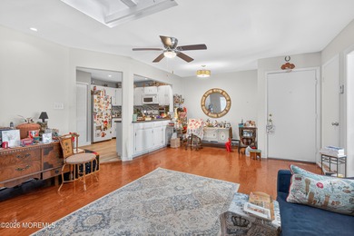 Quiet, private second-floor Navesink model set among the trees on Shadow Lake Village in New Jersey - for sale on GolfHomes.com, golf home, golf lot