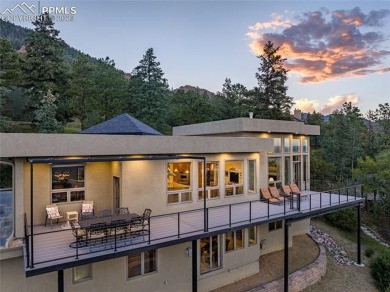 Set on the hillside in a peaceful and secluded location behind on Broadmoor Golf Club in Colorado - for sale on GolfHomes.com, golf home, golf lot
