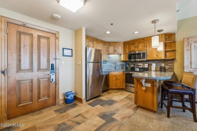 This 6th floor quarter share, 2-bedroom Grand Summit residence on Canyons Golf Course in Utah - for sale on GolfHomes.com, golf home, golf lot