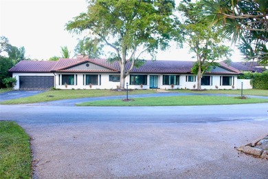 Experience Waterfront Living with this 5-bed, 4-bath Pool Home on Jacaranda Golf Club in Florida - for sale on GolfHomes.com, golf home, golf lot