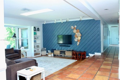 Experience Waterfront Living with this 5-bed, 4-bath Pool Home on Jacaranda Golf Club in Florida - for sale on GolfHomes.com, golf home, golf lot