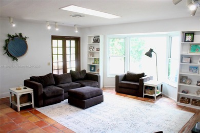 Experience Waterfront Living with this 5-bed, 4-bath Pool Home on Jacaranda Golf Club in Florida - for sale on GolfHomes.com, golf home, golf lot