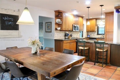 Experience Waterfront Living with this 5-bed, 4-bath Pool Home on Jacaranda Golf Club in Florida - for sale on GolfHomes.com, golf home, golf lot